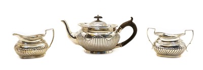 Lot 3 - A composite silver three piece teaset