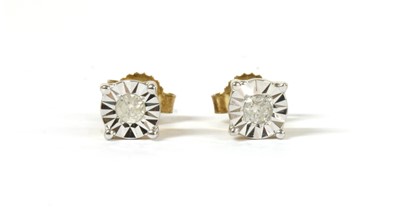 Lot 46 - A pair of gold single stone diamond stud earrings