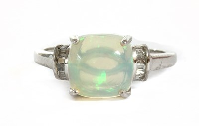 Lot 175 - A white gold opal and diamond ring