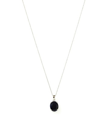 Lot 120 - A white gold single stone sapphire pendant