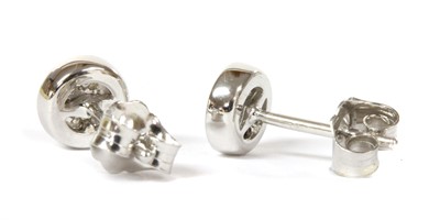 Lot 68 - A pair of white gold diamond earrings