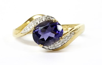 Lot 133 - A 9ct gold iolite and diamond ring