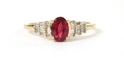 Lot 111 - A gold fracture filled ruby and diamond ring
