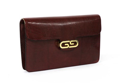 Lot 268 - A vintage Gucci red lizard skin clutch bag