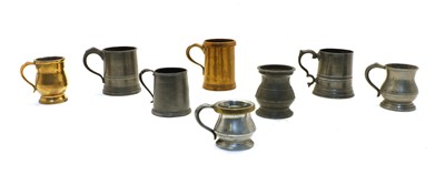 Lot 78 - Over forty 19th and 20th century pewter pub measures