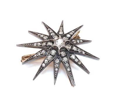 Lot 98 - A Victorian diamond set star brooch, c.1890
