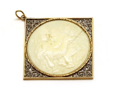 Lot 35 - A gold and silver, ivory and diamond cameo pendant