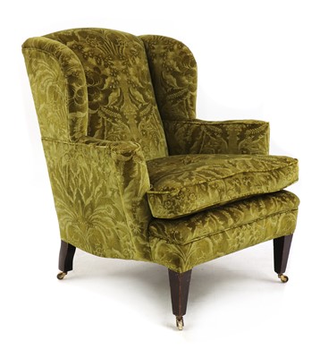 Lot 148 - A wingback armchair