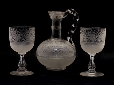 Lot 100 - An etched glass carafe and two glasses