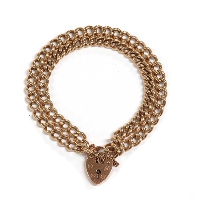 Lot 1101 - A 9ct gold two row curb bracelet