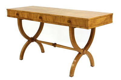 Lot 307 - An Art Deco sycamore writing table