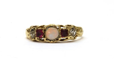 Lot 1014 - A gold opal, ruby and diamond ring