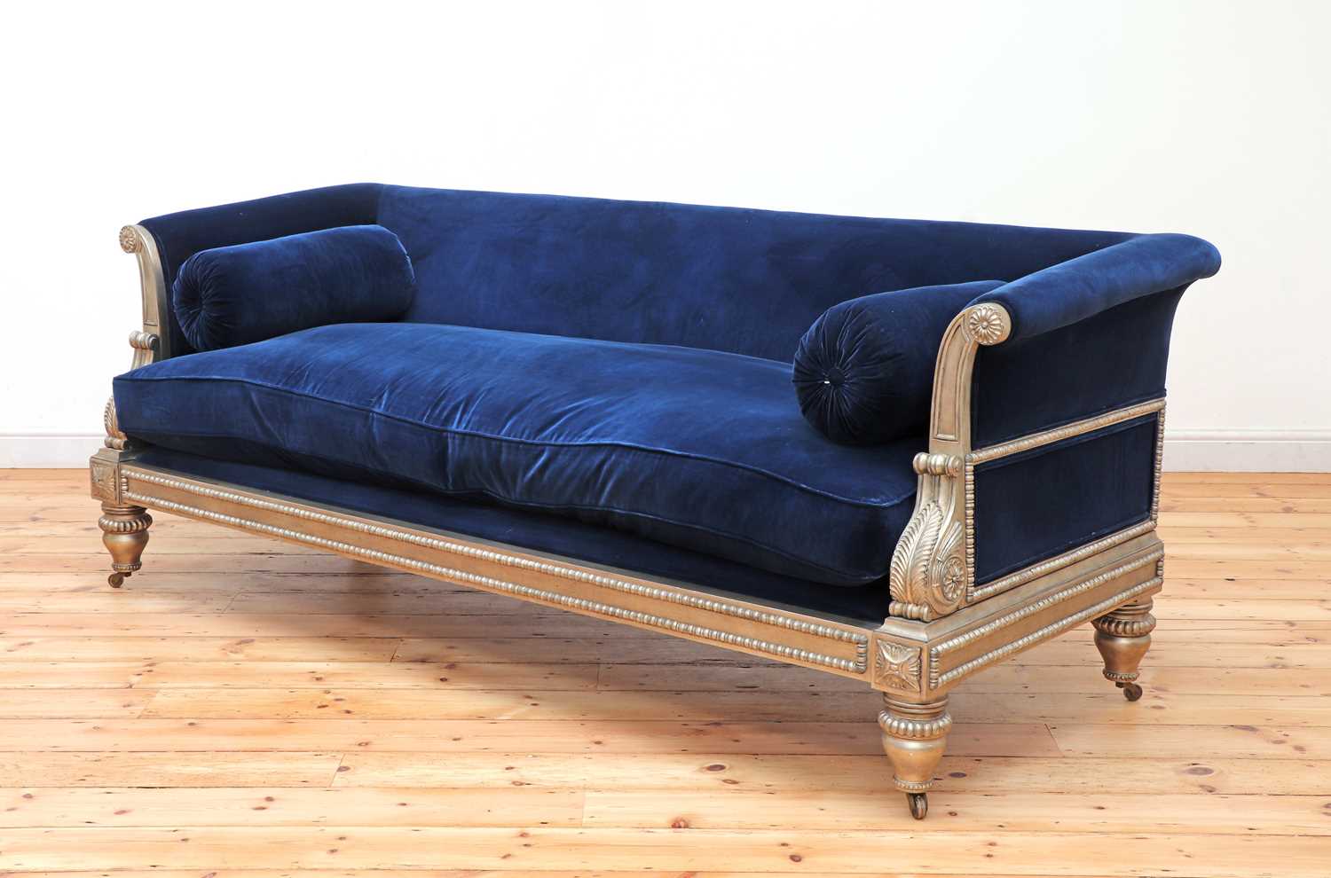Lot 468 - A modern Regency-style sofa