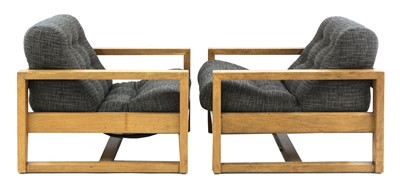 Lot 767 - A pair of oak 'Beaufort' armchairs