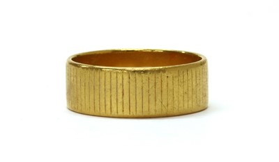 Lot 1072 - A 22ct gold flat section wedding ring