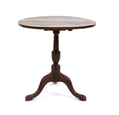 Lot 309 - A circular mahogany flip top table