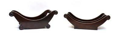 Lot 234 - Three Georgian mahogany cheese coasters