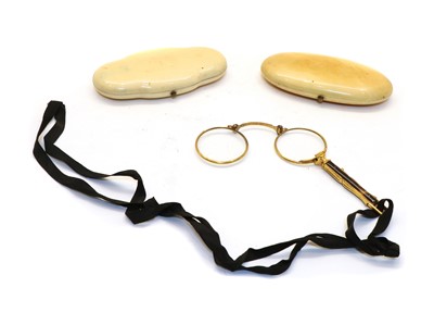 Lot 135 - A 19th century French gold, ivory and steel necessaire