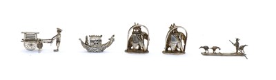 Lot 24 - A small late 19th century Chinese silver model of an oriental