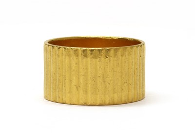 Lot 1071 - A 22ct gold flat section wedding ring