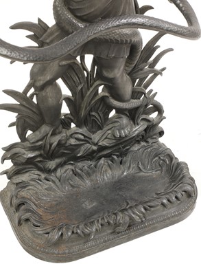 Lot 64 - A cast iron stick or umbrella stand