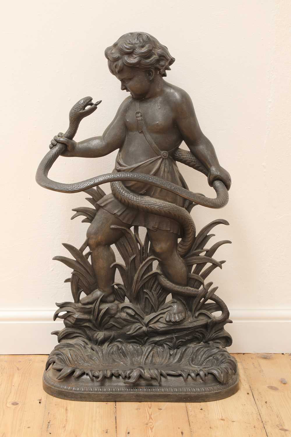 Lot 64 - A cast iron stick or umbrella stand