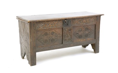 Lot 552 - An oak coffer