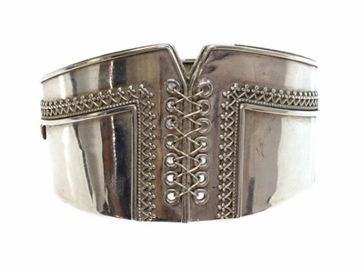 Lot 78 - A Victorian sterling silver hinged bangle of corset form