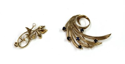 Lot 1393 - A 9ct gold sapphire spray brooch