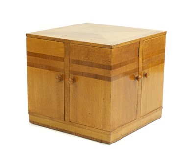 Lot 227 - An Art Deco oak and walnut crossbanded book table
