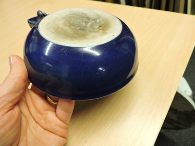 Lot 84 - A Chinese porcelain pouring bowl