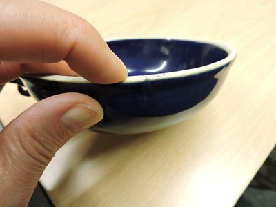 Lot 84 - A Chinese porcelain pouring bowl
