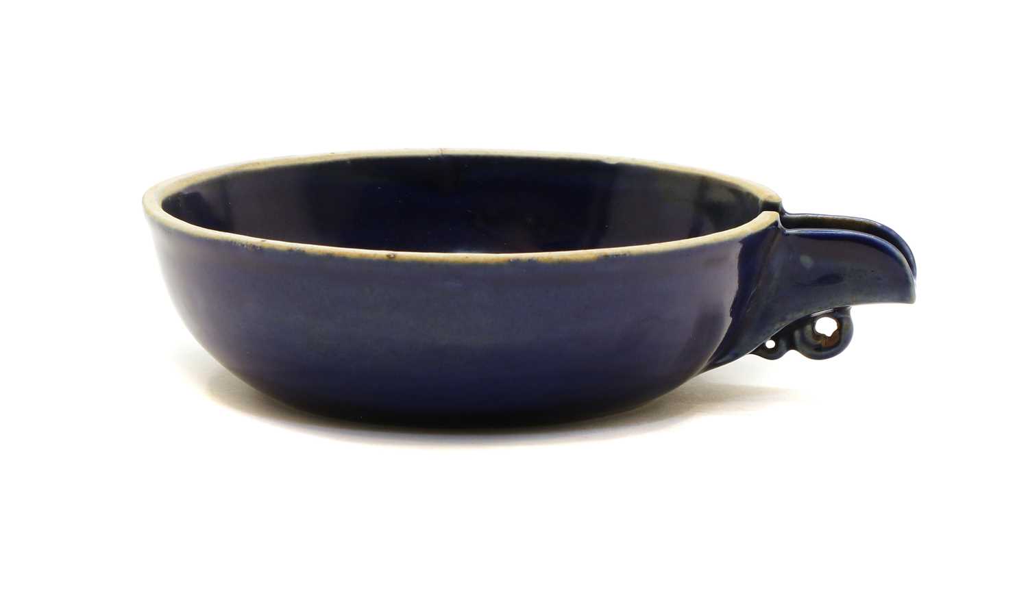 Lot 84 - A Chinese porcelain pouring bowl