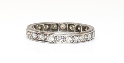 Lot 148 - A platinum diamond set full eternity ring
