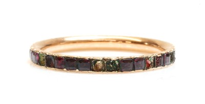 Lot 16 - A Georgian garnet set full eternity ring