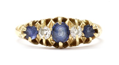 Lot 1028 - An Edwardian 18ct gold sapphire and diamond five stone ring