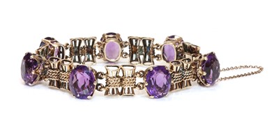 Lot 206 - A gold amethyst bracelet, c.1945-1955