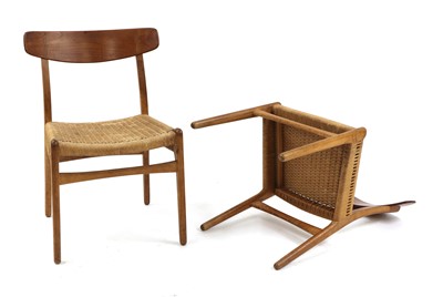 Lot 612 - A set of seven 'CH23' dining chairs
