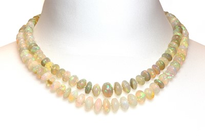 Lot 284 - A two row graduated opal bead necklace