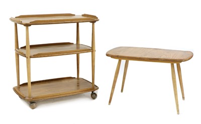 Lot 210 - A blonde Ercol elm trolley