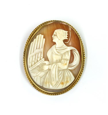 Lot 1012 - A 9ct gold shell cameo brooch