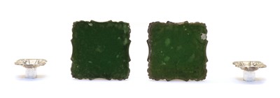 Lot 64 - A pair of Queen Anne style candlesticks by Ellis & Co
