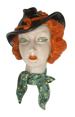 Lot 243 - A Goldscheider pottery wall mask