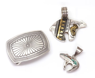Lot 274 - A silver Navajo Spirit bear pendant, by Thomas Singer