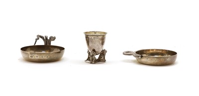 Lot 25 - A Silver Club silver tasting dish with serpent handle
