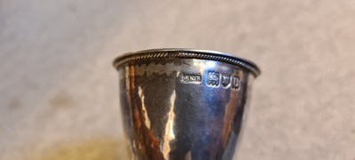 Lot 25 - A Silver Club silver tasting dish with serpent handle