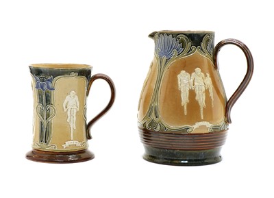 Lot 106 - A Doulton Lambeth cycling jug and mug