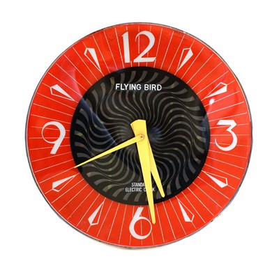 Lot 483 - A Standard Electric 'Flying Bird' wall clock