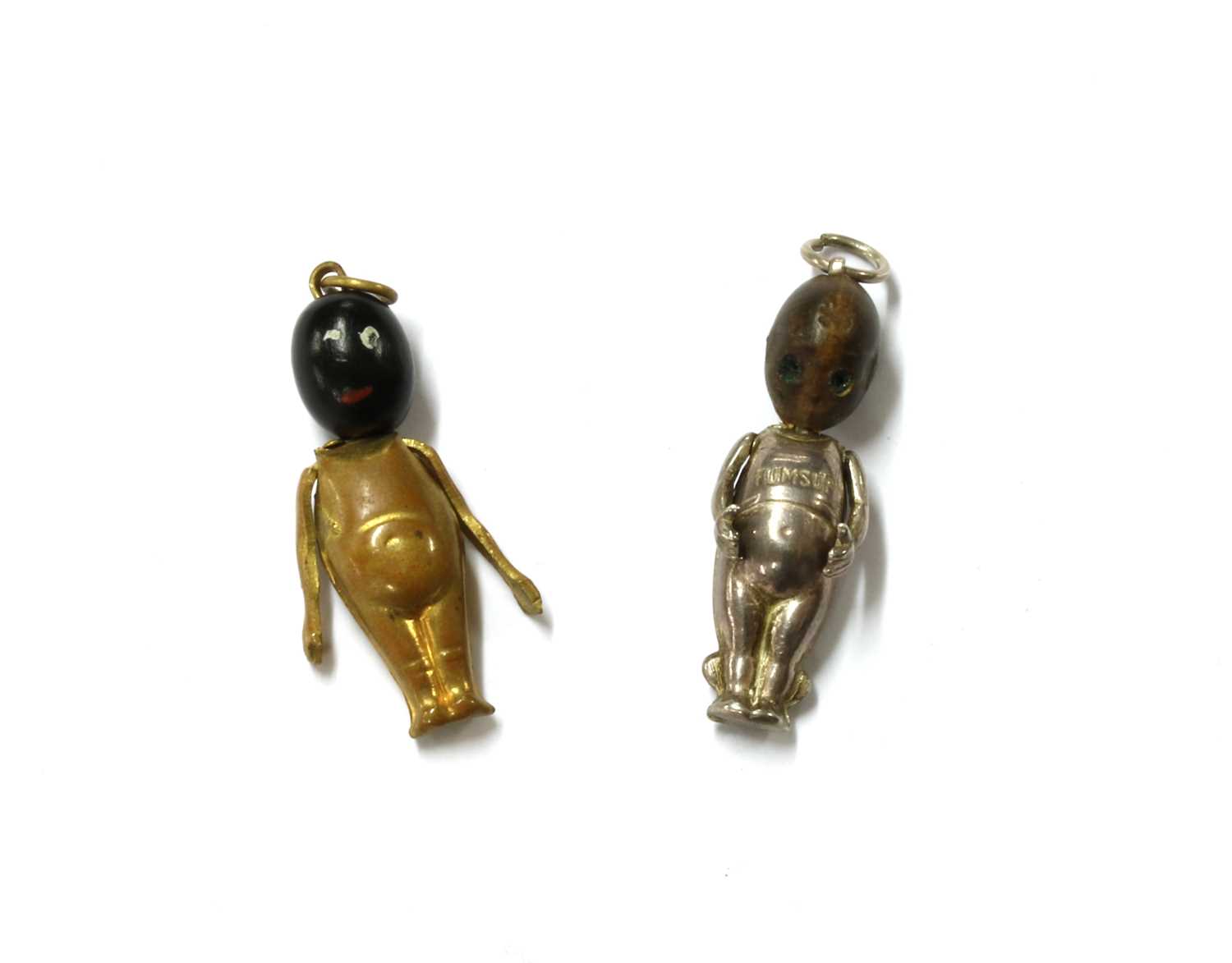 Lot 1046 - A WWI Fumsup good luck charm