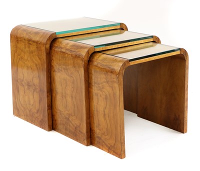 Lot 253 - An Art Deco maple nest of tables